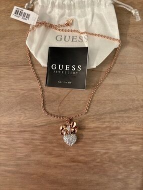 GUESS Rose Gold and silver Bow with Crystal Heart Pendant Necklace